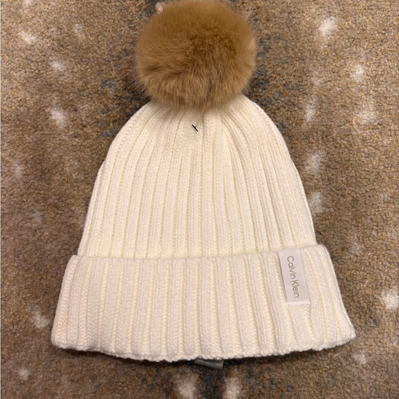 Calvin Klein Accessories - Calvin Klein White Knit Beanie with Brown Pom NWOT